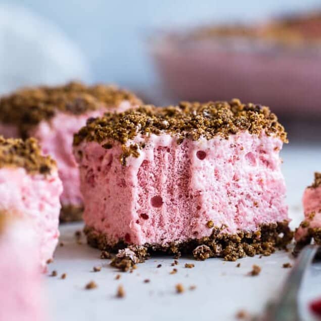 Strawberry Freeze - A low calorie, quick and easy, gluten free healthy Frozen Strawberry Dessert Recipe with a crunchy, pecan crumble! Always a hit with kids and adults and everyone always wants the recipe! | #Foodfaithfitness | #Glutenfree #Dairyfree #Healthy #Strawberries #Dessert