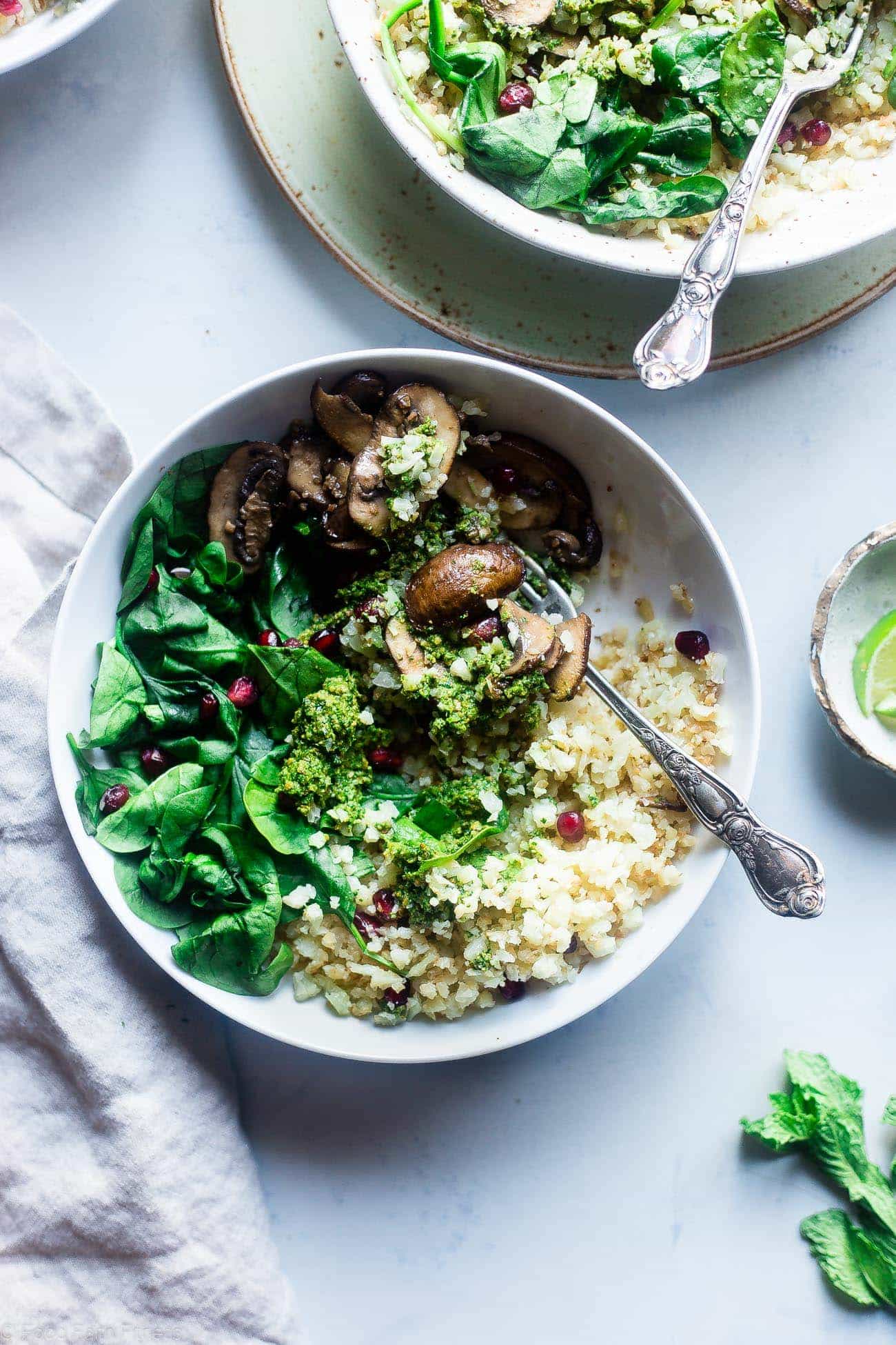 Vegan Detox Cauliflower Bowls - These low carb bowls are packed with veggies and a delicious almond pesto! They're a whole30 compliant, vegan and paleo friendly meal that is only 200 calories! | Foodfaithfitness.com | @ FoodFaithFit