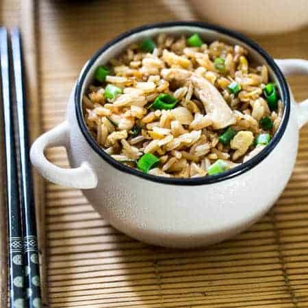 Easy Chicken Fried Rice - This chicken fried rice is better than takeout, and you can eat it without leaving your house! It's a quick, gluten free weeknight dinner that's always a crowd pleaser! | Foodfaithfitness.com | @FoodFaithFit