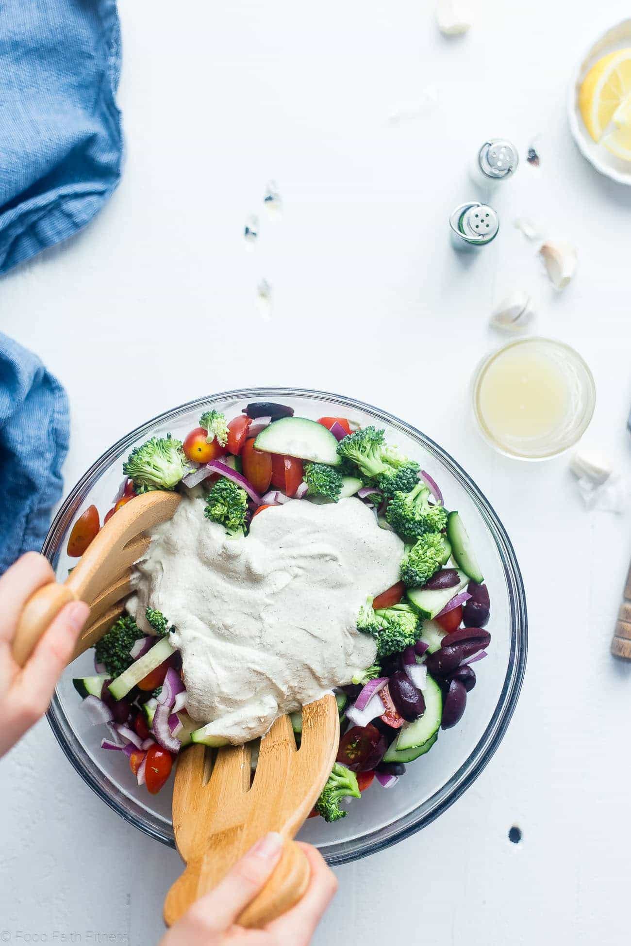 Greek Gluten Free Broccoli Salad - This low carb, raw broccoli salad is so creamy you'll never know it's vegan, paleo and whole30 compliant! It's an easy side dish that's perfect for spring potlucks! | Foodfaithfitness.com | @FoodFaithFit